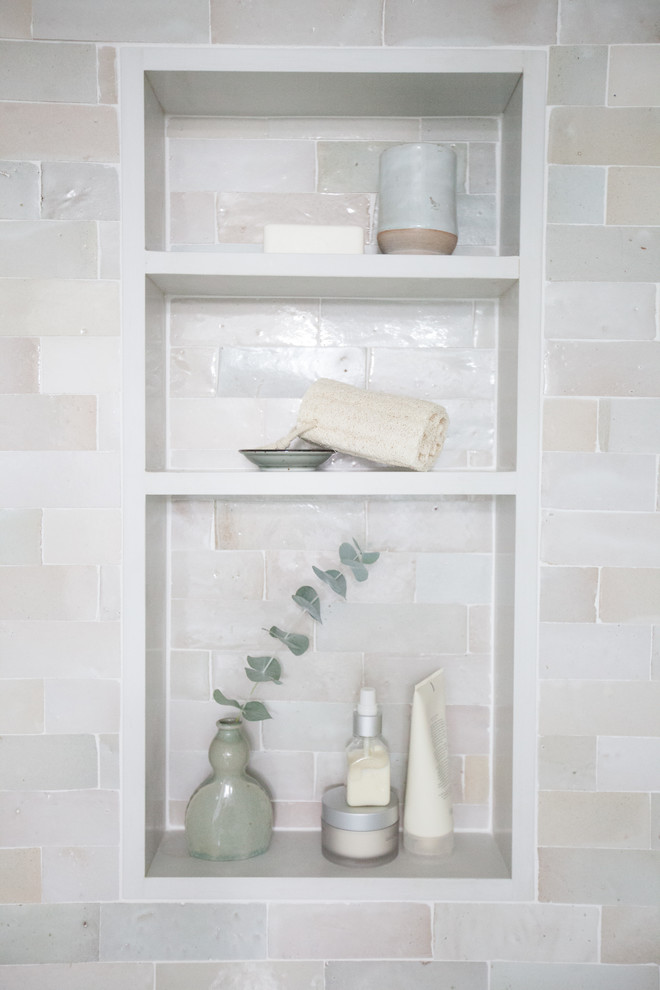 Inspiration for a mid-sized mediterranean bathroom in Los Angeles with white tile and subway tile.