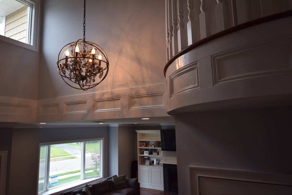 Inspiration for a transitional dark wood floor entryway remodel