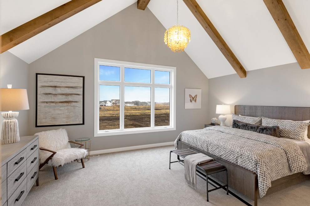 Transitional master bedroom in Minneapolis with grey walls, carpet and exposed beam.
