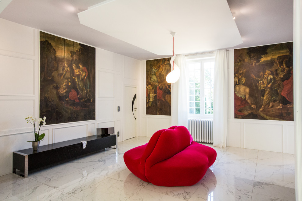 This is an example of a large contemporary hallway in Bordeaux with white walls and marble floors.
