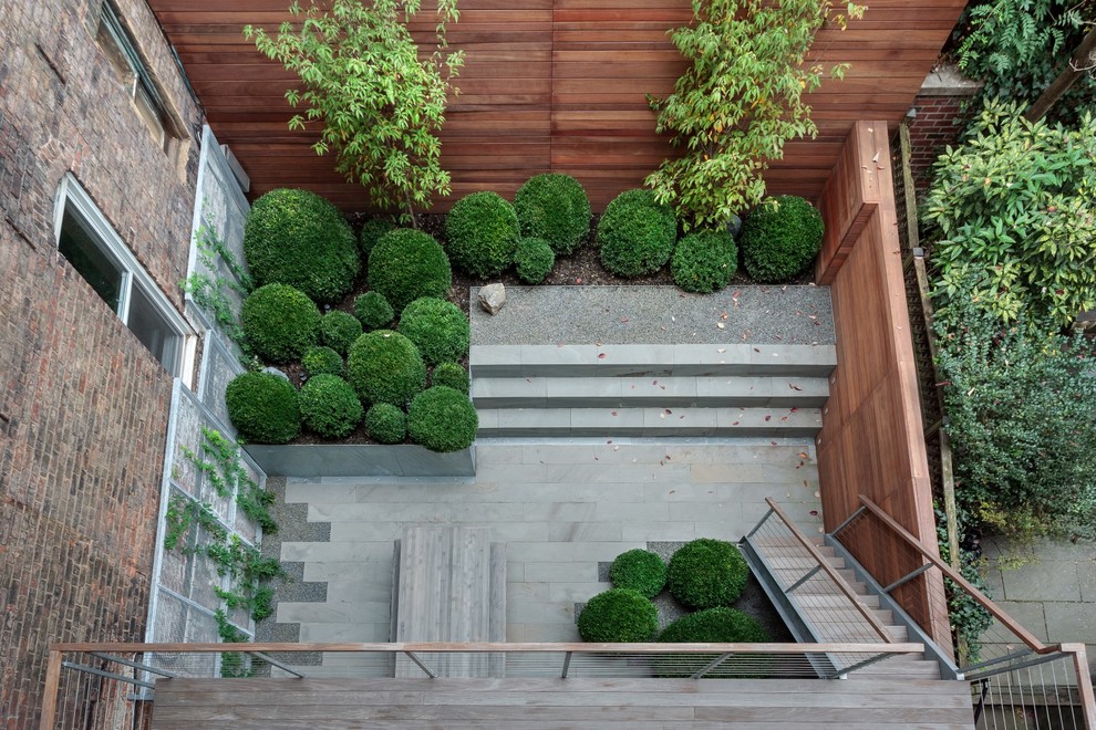 Design ideas for a small backyard deck in New York.