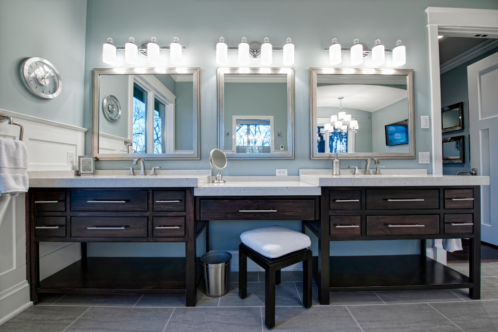 Bathroom - large transitional master gray tile and ceramic tile ceramic tile bathroom idea with beaded inset cabinets, dark wood cabinets, quartz countertops and blue walls