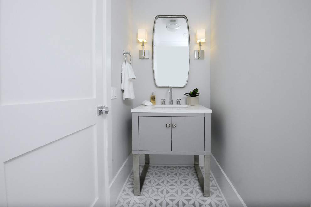 Design ideas for a large country cloakroom in New York with flat-panel cabinets, black cabinets, a one-piece toilet, white tiles, marble tiles, beige walls, marble flooring, a submerged sink, granite worktops, white floors, white worktops and a built in vanity unit.
