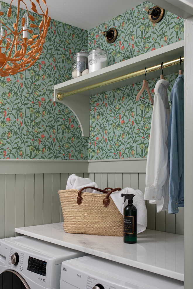 Inspiration for a beach style laundry room in Other with wallpaper.