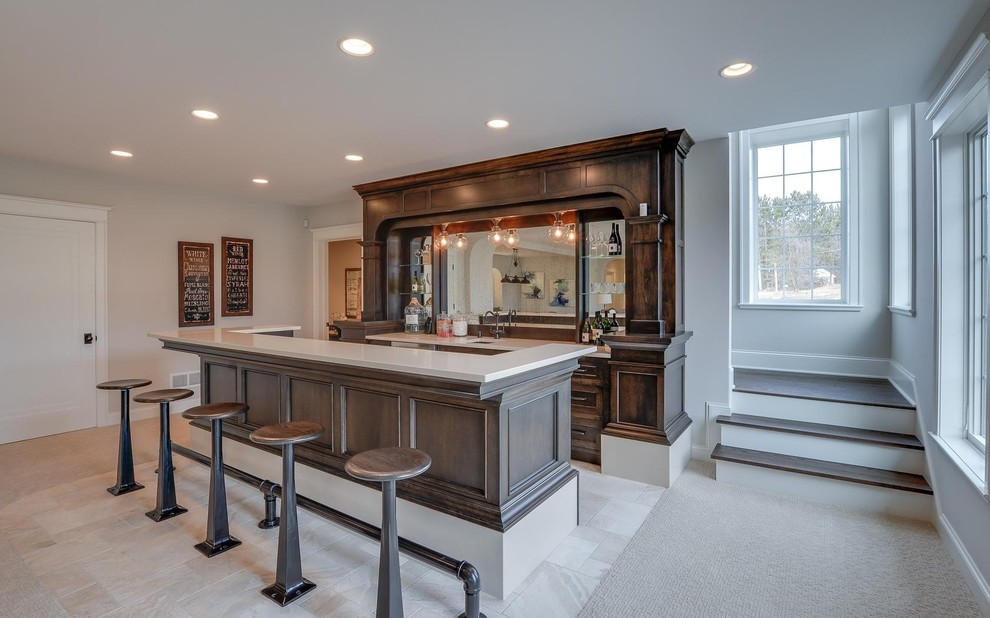 Design ideas for a large traditional galley seated home bar in Minneapolis with an undermount sink, flat-panel cabinets, dark wood cabinets, quartzite benchtops, mirror splashback, ceramic floors and beige floor.
