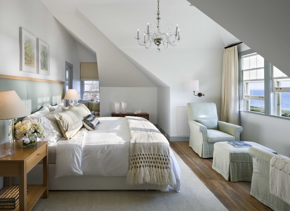 Inspiration for a mid-sized beach style master bedroom in Boston with white walls and dark hardwood floors.