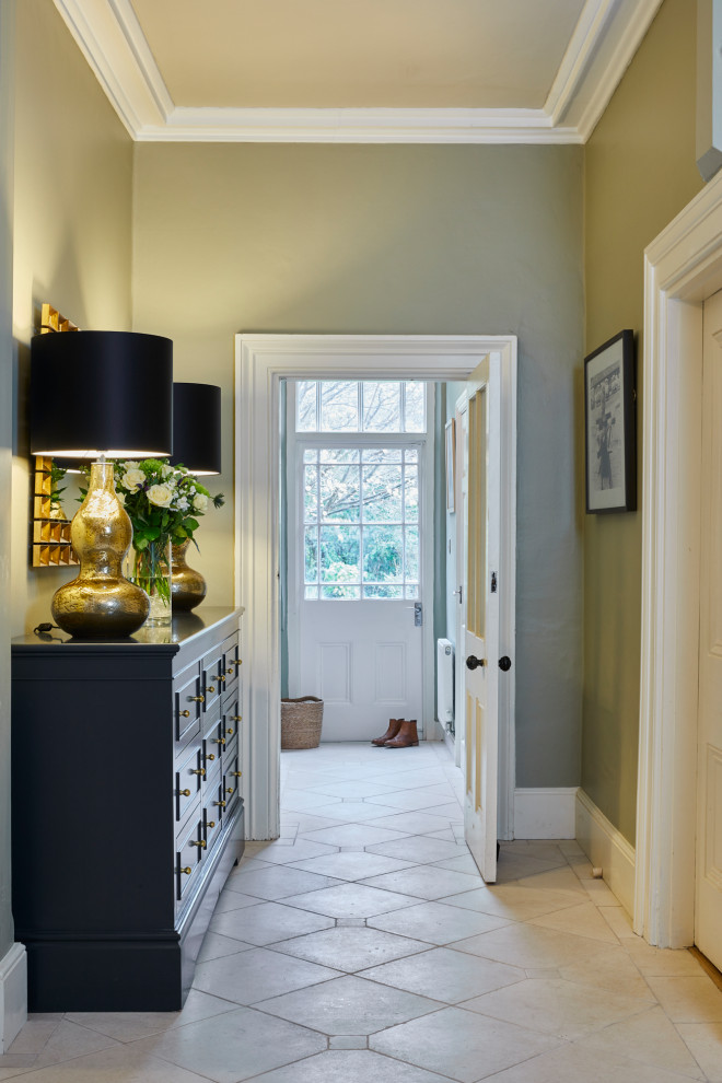 Inspiration for a large transitional limestone floor and beige floor entry hall remodel in West Midlands