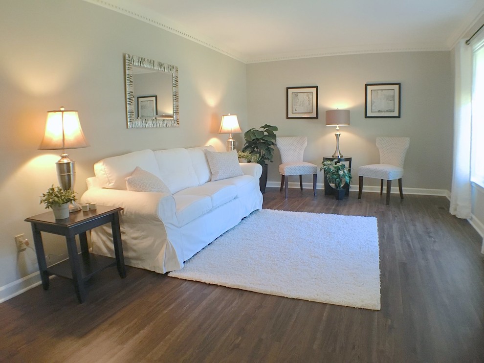 Living room - mid-sized traditional formal and enclosed vinyl floor living room idea in San Diego with gray walls, no fireplace and no tv