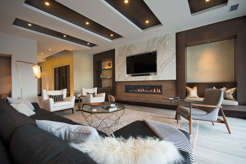 This is an example of a large contemporary formal open concept living room in Other with a ribbon fireplace, a stone fireplace surround, beige floor, beige walls and a wall-mounted tv.