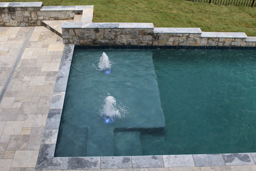 Small mountain style backyard stone and rectangular natural hot tub photo in DC Metro