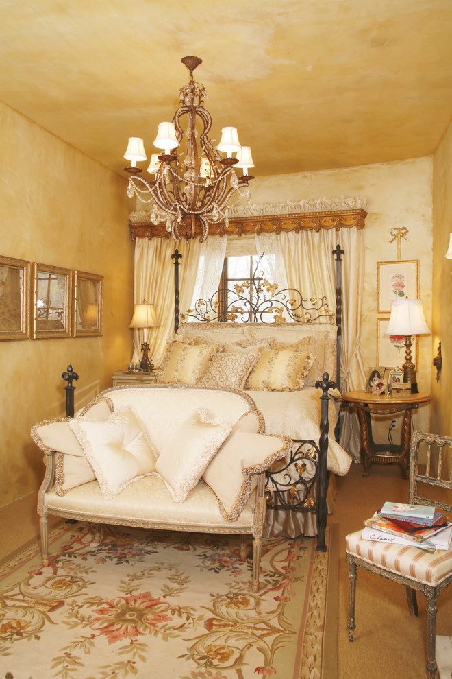 Inspiration for a mediterranean bedroom in Minneapolis with beige walls.