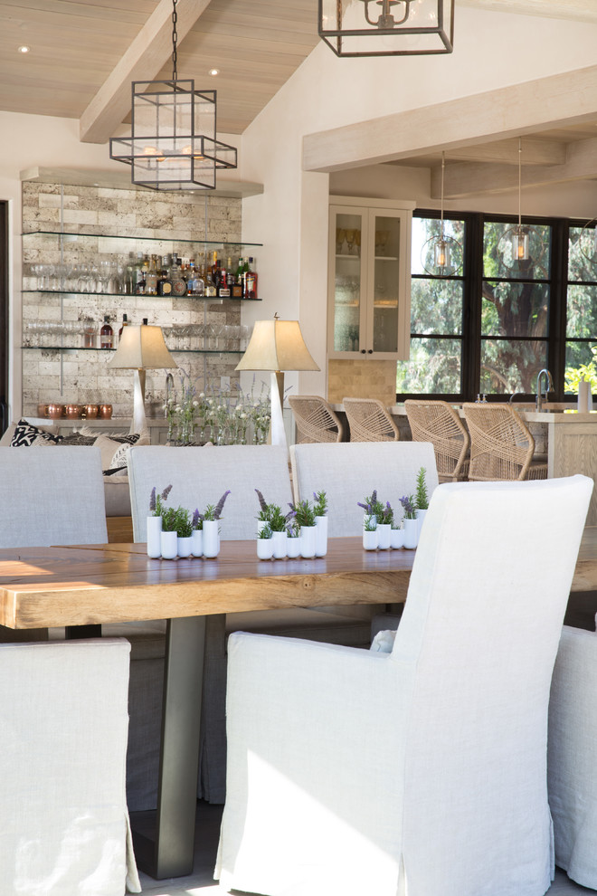 Mid-sized transitional open plan dining in Santa Barbara with white walls, no fireplace, beige floor and light hardwood floors.