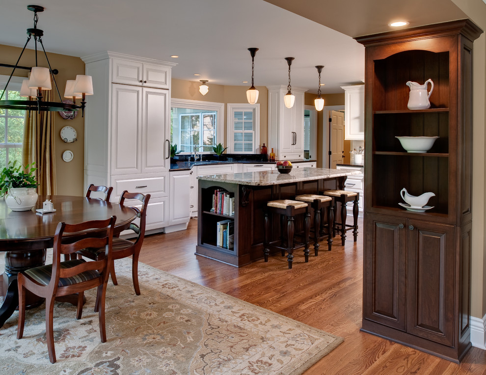 Inspiration for a traditional kitchen in Detroit with panelled appliances.