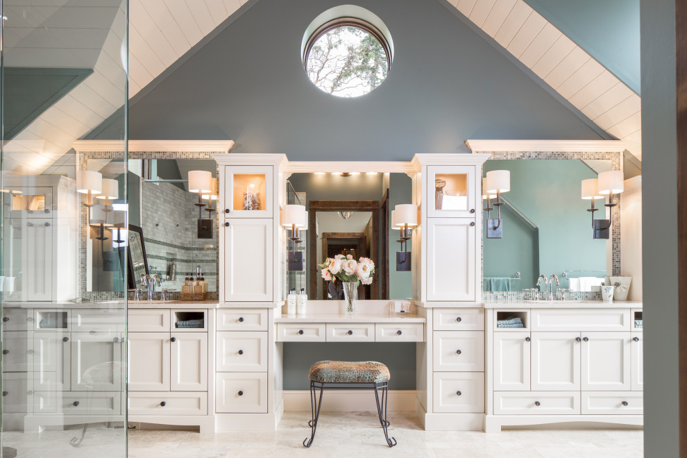 Inspiration for a country bathroom in Vancouver with recessed-panel cabinets, white cabinets, an undermount sink, grey floor and white benchtops.