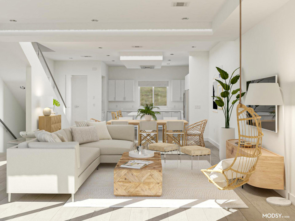 Esempio di un soggiorno tropicale di medie dimensioni e aperto con pareti bianche e parquet chiaro