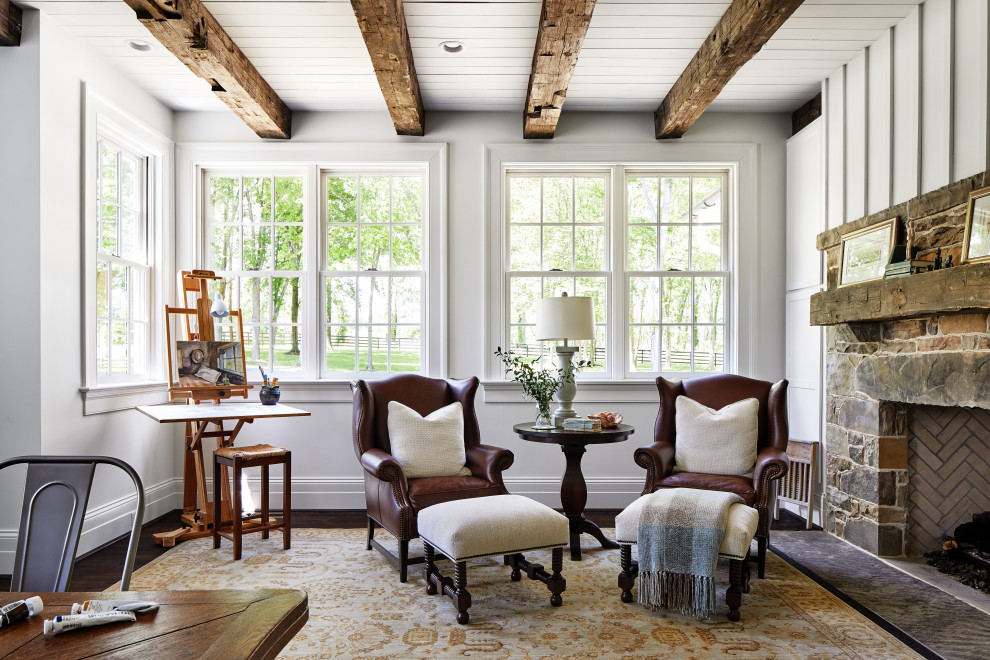 Home office in Other with white walls, dark hardwood floors, brown floor and exposed beam.