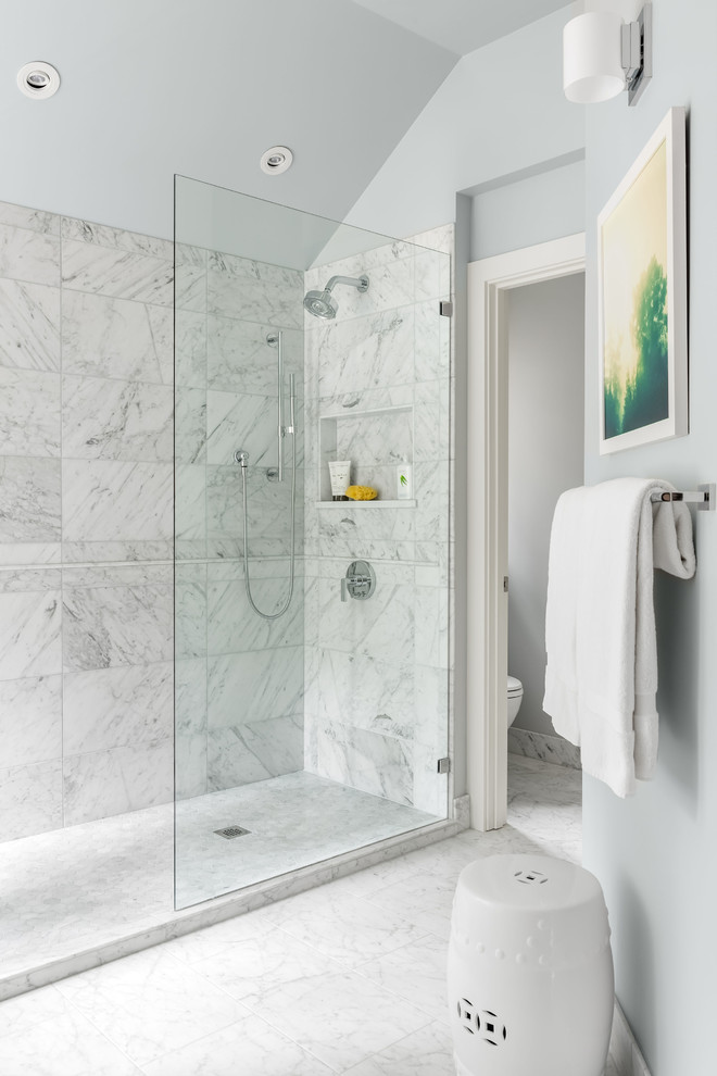 Photo of a mid-sized transitional master bathroom in Seattle with shaker cabinets, grey cabinets, a freestanding tub, an open shower, a two-piece toilet, white tile, marble, grey walls, marble floors, an undermount sink, engineered quartz benchtops, white floor, an open shower and white benchtops.