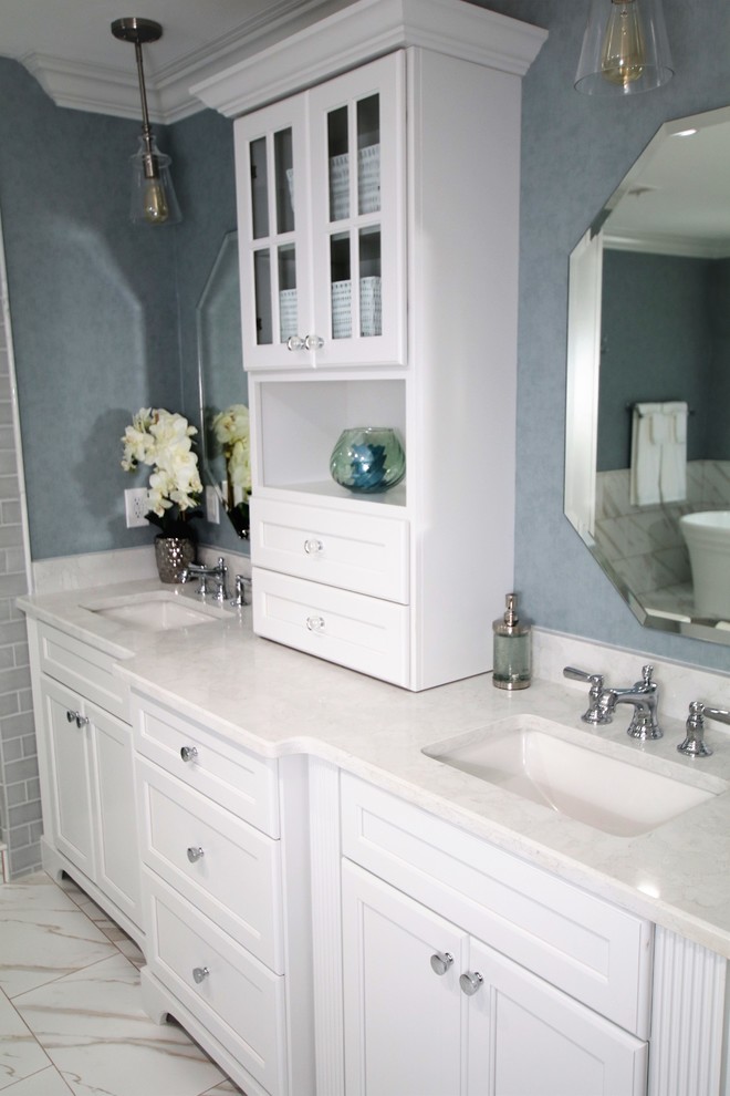Inspiration for a large traditional master bathroom in Atlanta with white cabinets, a freestanding tub, a corner shower, gray tile, porcelain tile, an undermount sink, quartzite benchtops and a hinged shower door.