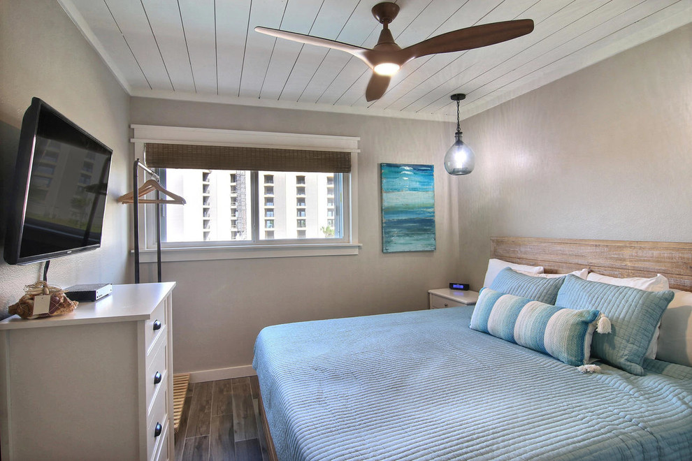 This is an example of a beach style bedroom in Austin.