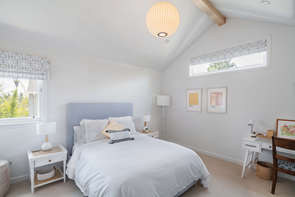 Inspiration for a mid-sized transitional guest carpeted, beige floor and vaulted ceiling bedroom remodel in Los Angeles with white walls