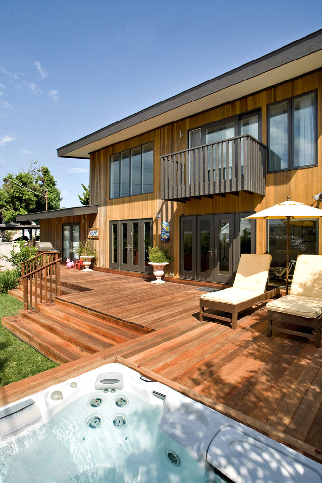 This is an example of a contemporary backyard deck in San Diego with no cover.