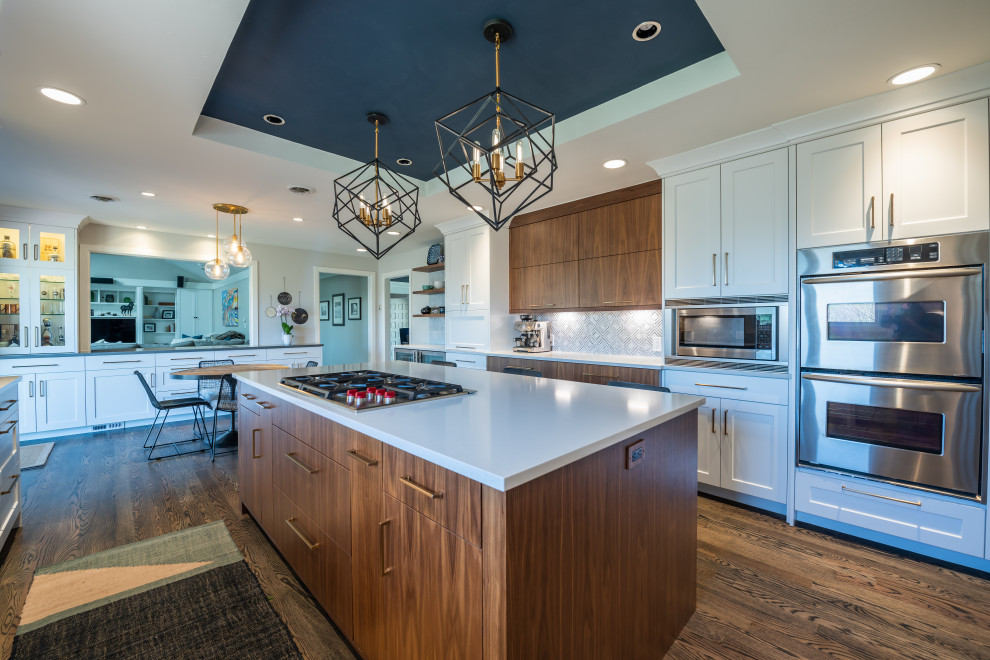 Example of a transitional kitchen design in Denver
