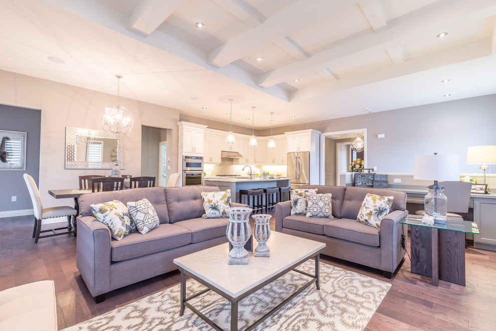 Expansive transitional formal enclosed living room in Toronto with grey walls, dark hardwood floors, a standard fireplace, a stone fireplace surround, a wall-mounted tv and brown floor.
