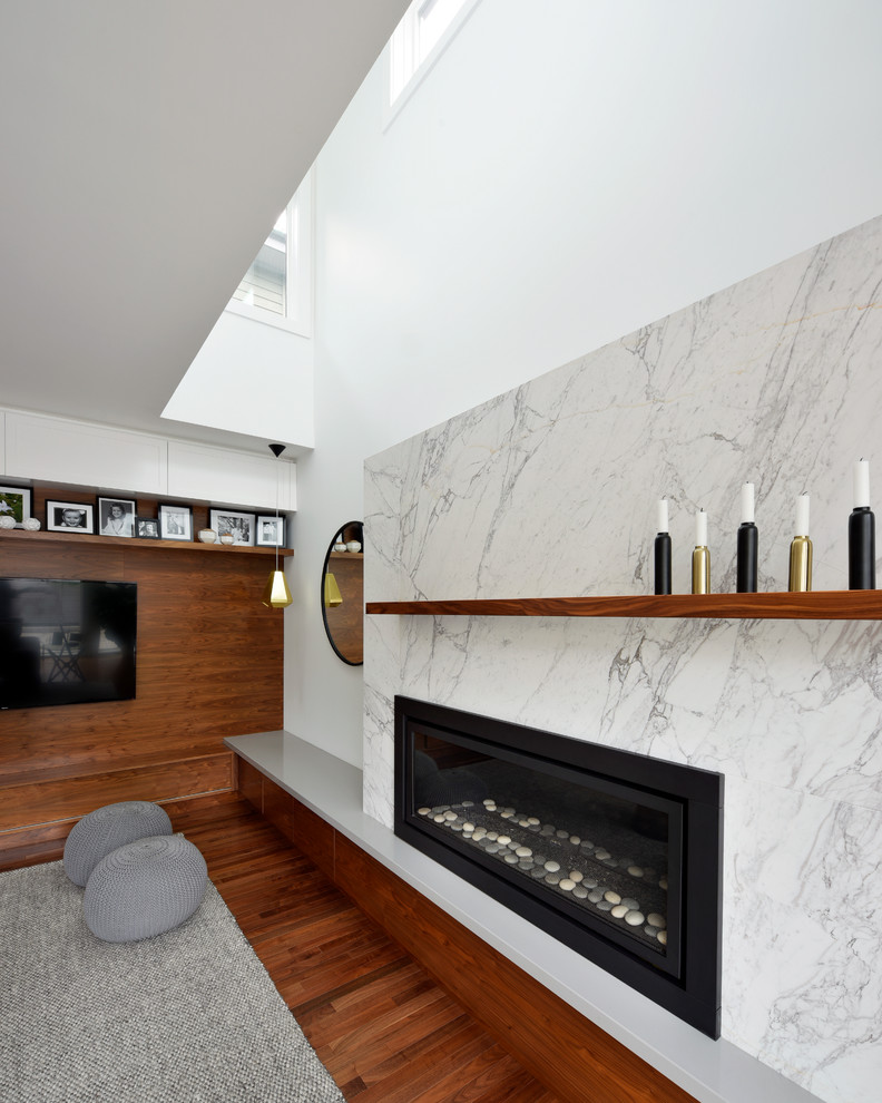This is an example of a contemporary family room in Ottawa.