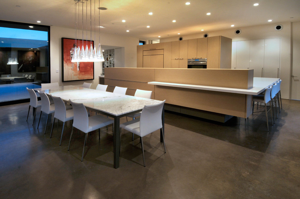 This is an example of a contemporary open plan dining in Phoenix.