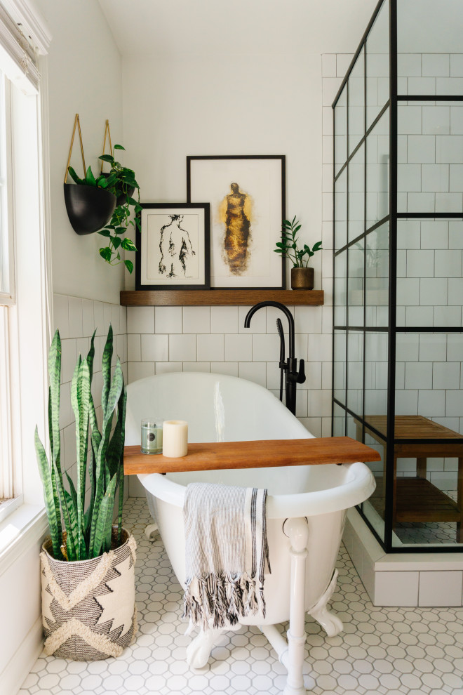Inspiration for a small eclectic master bathroom in Atlanta with flat-panel cabinets, medium wood cabinets, a claw-foot tub, a corner shower, white walls, ceramic floors, an undermount sink, marble benchtops, white floor, a hinged shower door, a single vanity and a built-in vanity.