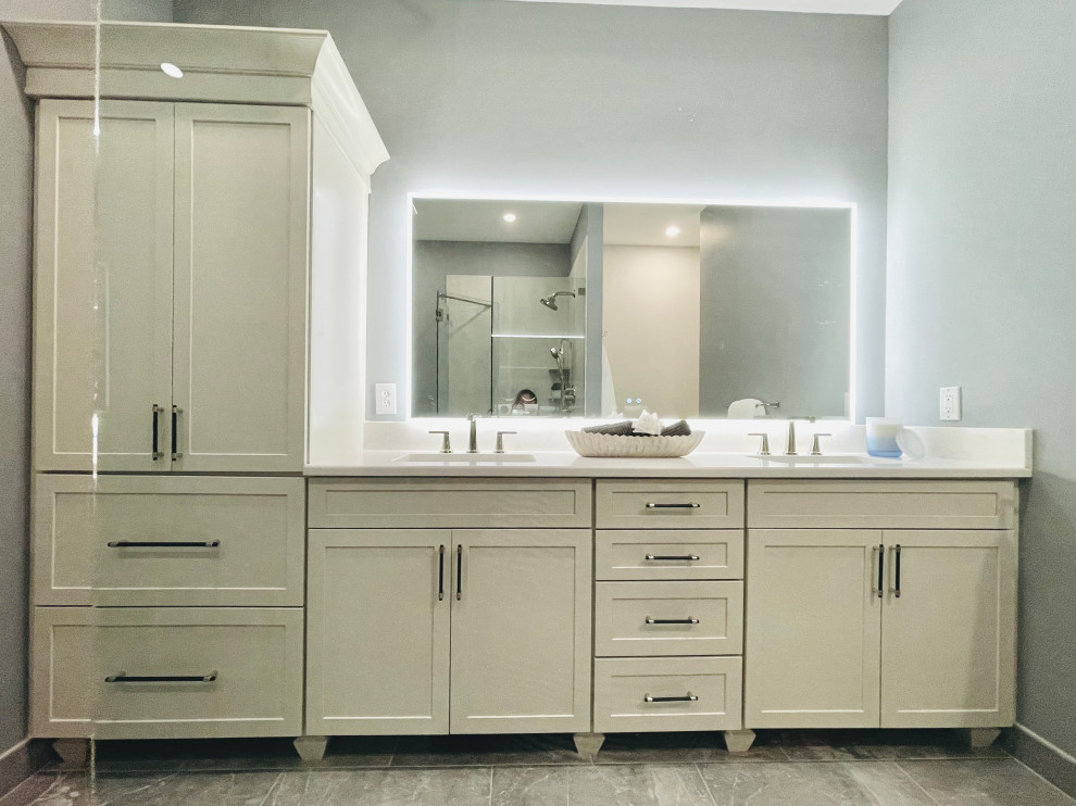 After picture - Tall linen cabinet with expanded vanity and back lit vanity mirr