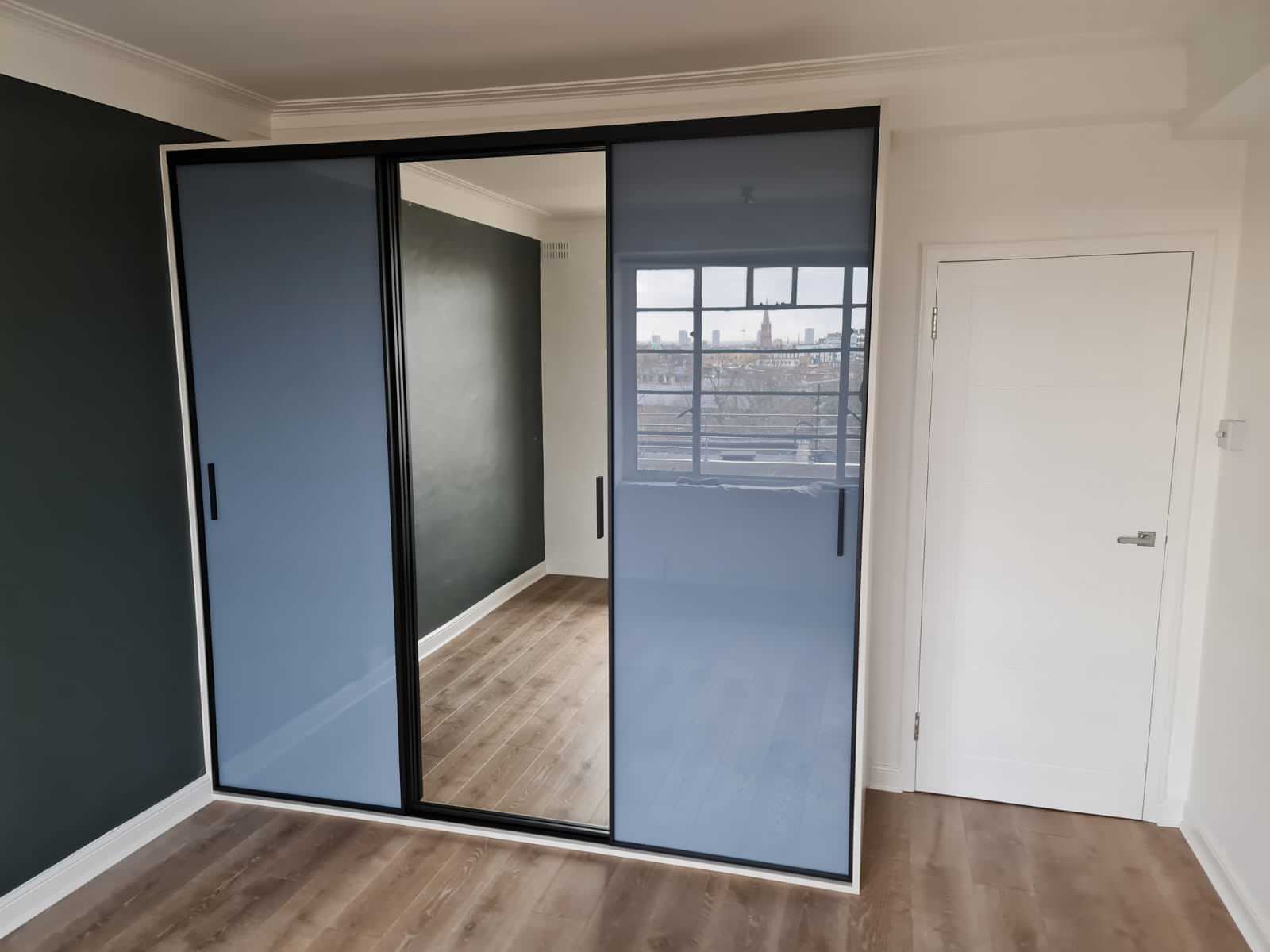 Blue and mirrored wardrobe