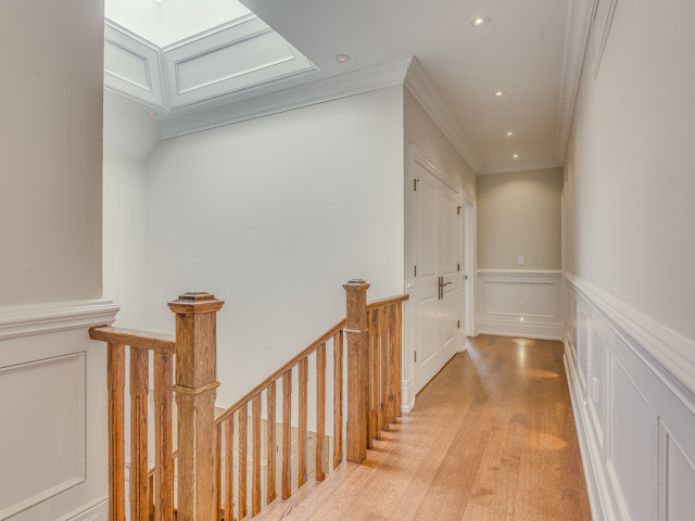 Example of a transitional home design design in Toronto