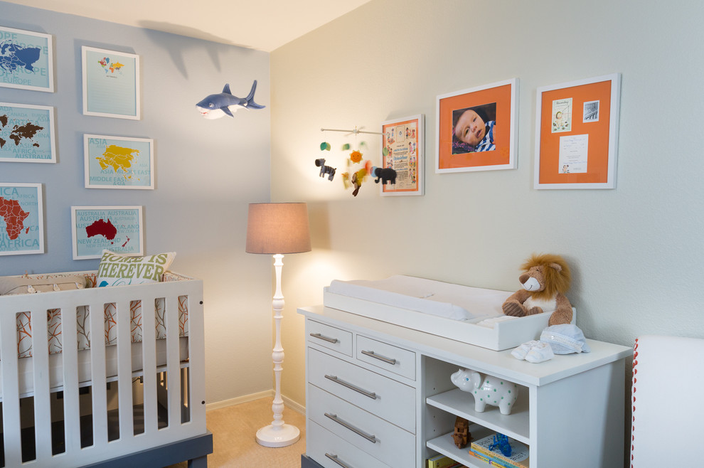 This is an example of a medium sized modern nursery in Phoenix.