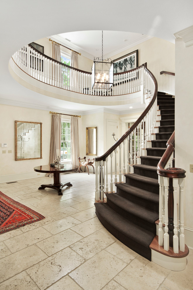 Photo of a traditional foyer in New York with white walls.