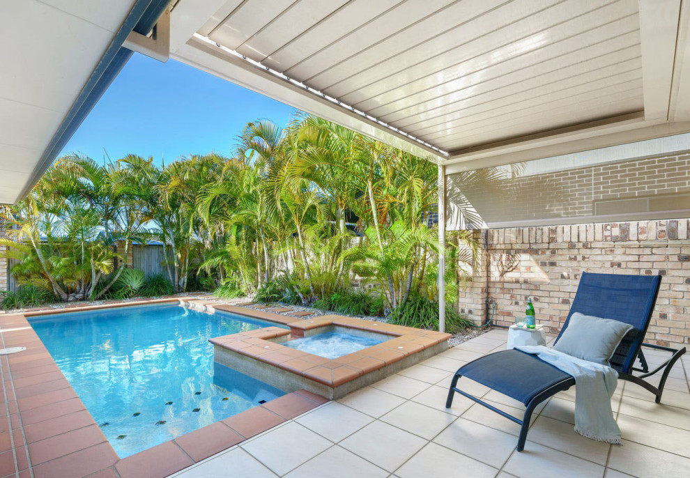 Photo of a beach style pool in Brisbane.