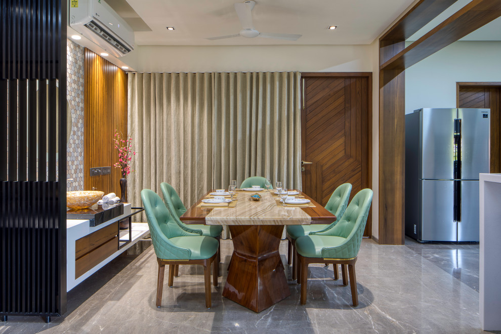 Minimalist dining room photo in Ahmedabad