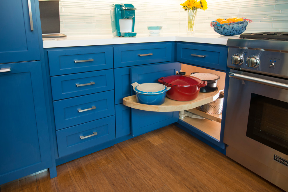 Design ideas for a transitional u-shaped kitchen in San Francisco with shaker cabinets and blue cabinets.