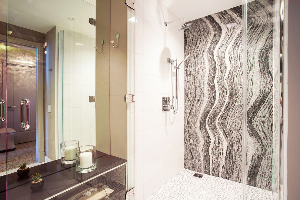 Mid-sized contemporary bathroom in Los Angeles with an alcove shower, black and white tile, white tile, porcelain tile, pebble tile floors and white floor.