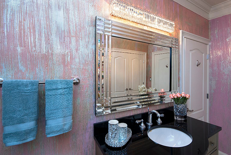 Tub/shower combo - mid-sized transitional 3/4 porcelain tile tub/shower combo idea with beaded inset cabinets, black cabinets, an undermount tub, pink walls, an undermount sink and granite countertops