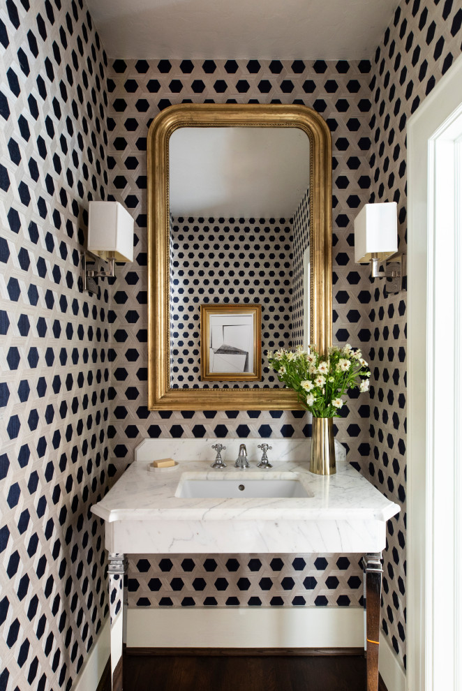 Inspiration for a transitional powder room in Houston.