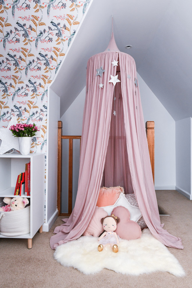 Mid-sized traditional kids' playroom in Sydney with pink walls, carpet, beige floor, vaulted and wallpaper for kids 4-10 years old and girls.