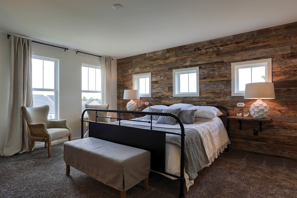 Inspiration for a mid-sized country master bedroom in Other with brown walls, carpet, no fireplace and brown floor.