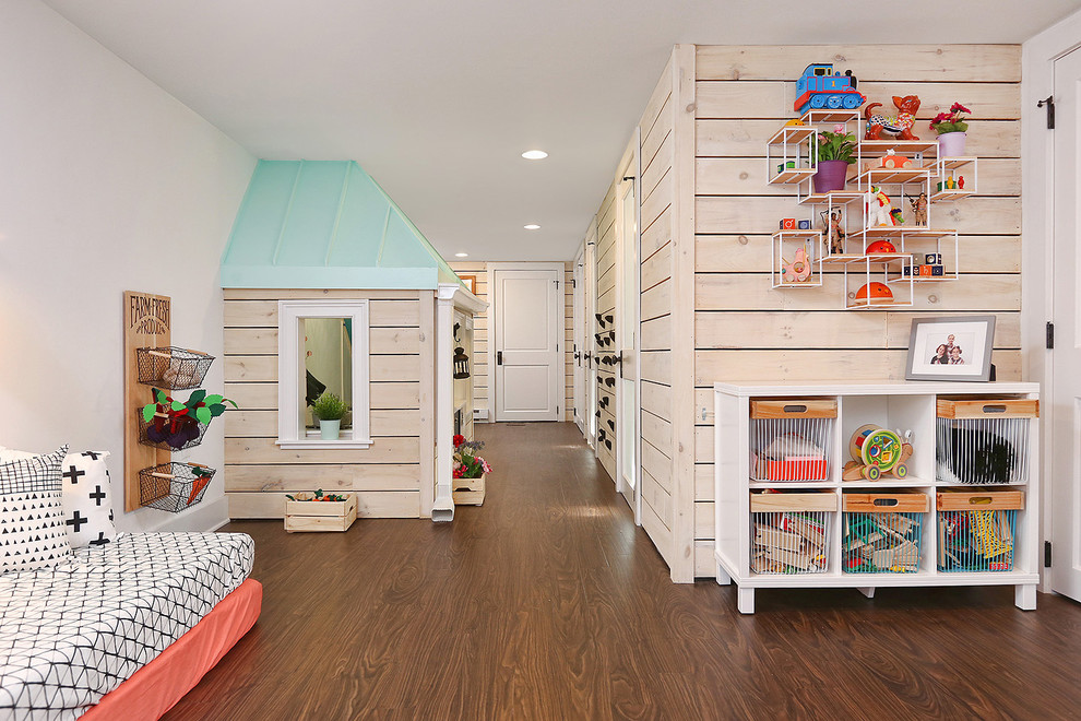 This is an example of a large country kids' room in Philadelphia with white walls, dark hardwood floors and brown floor.