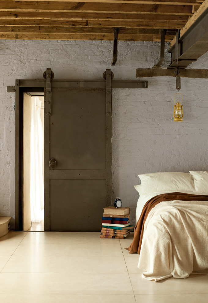 Design ideas for an industrial bedroom in Buckinghamshire.
