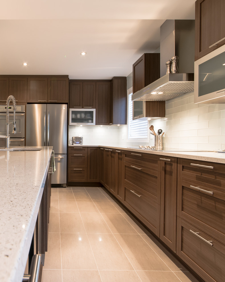 Large contemporary kitchen in Montreal with with island.