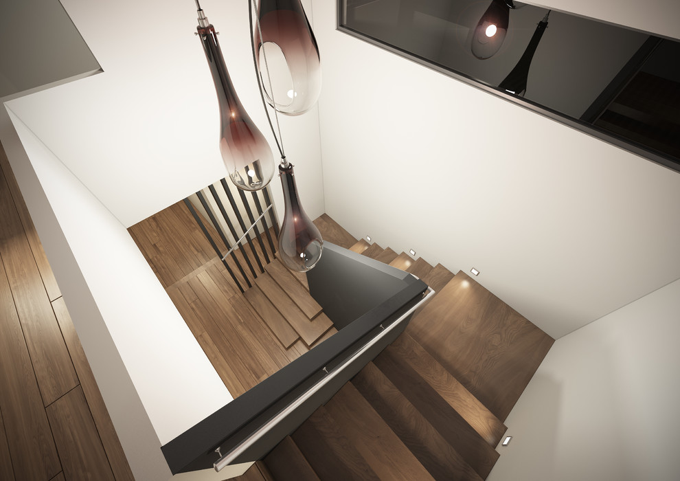 Mid-sized contemporary wood u-shaped staircase in Melbourne with wood risers.