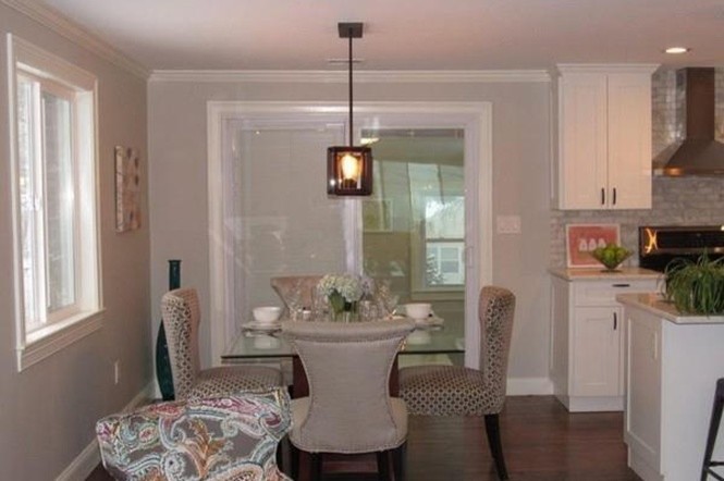Kitchen/dining room combo - transitional dark wood floor kitchen/dining room combo idea in Boston with gray walls