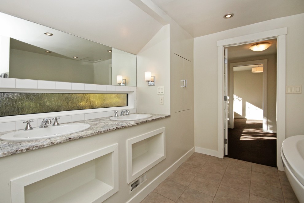 Transitional home design photo in Calgary