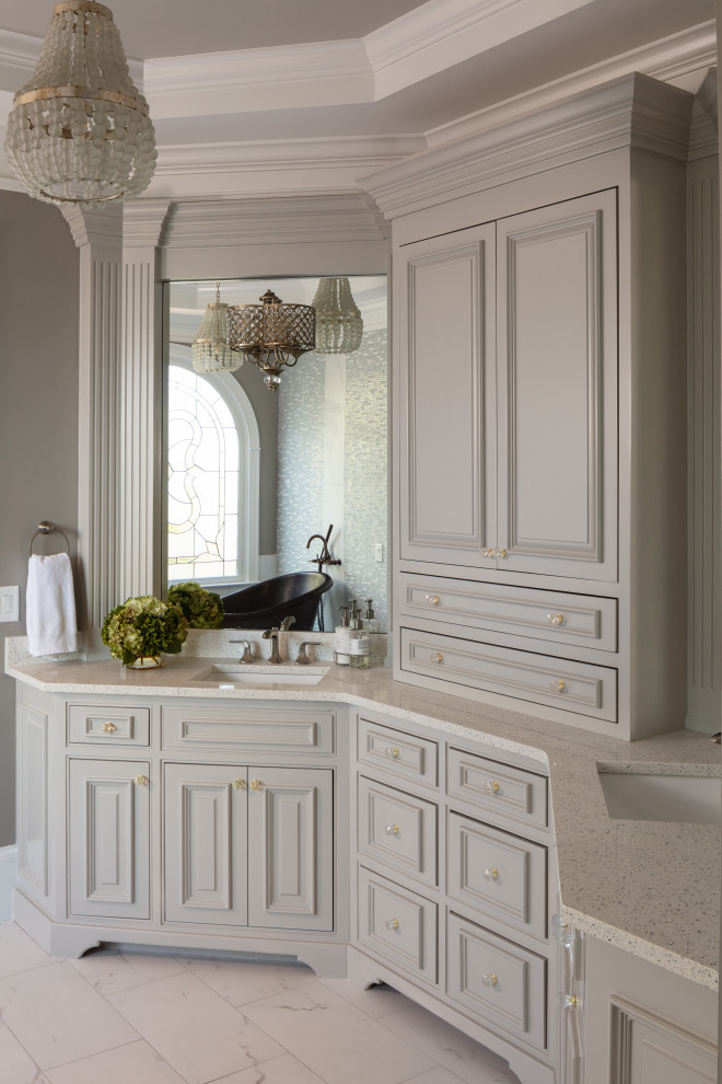 Large transitional master white tile and ceramic tile ceramic tile, white floor and double-sink freestanding bathtub photo in Atlanta with recessed-panel cabinets, gray cabinets, a two-piece toilet, gray walls, an undermount sink, quartz countertops, white countertops and a built-in vanity